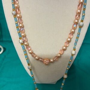 Pink pearls blue and white beads necklaces.
